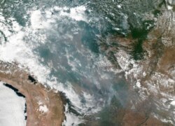 This satellite image provided by NASA shows the fires in Brazil on Aug. 20, 2019. As fires raged in the Amazon rainforest, the government denounced critics who say President Jair Bolsonaro is not doing enough.
