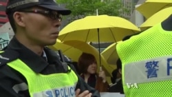 China Quiet as Hong Kong, Taiwan Challenges Grow