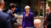 La Première ministre britannique Theresa May, au centre, lors d'un sommet de l'UE à Bruxelles, le 18 octobre 2018.