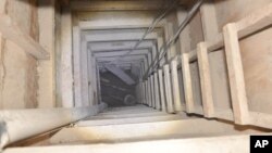 The exit of the tunnel that according to authorities was used by Mexican drug lord Joaquin "El Chapo" Guzman, to escape from the Altiplano maximum security prison is seen in Almoloya, Mexico, July 14, 2015. 
