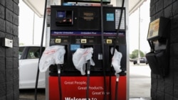 Gas pumps are covered with plastic bags at the Race Trac gas station, after a cyberattack crippled the biggest fuel pipeline in the country, run by Colonial Pipeline, in St. Petersburg, Florida, U.S., May 12, 2021. REUTERS/Octavio Jones