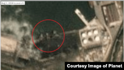 일일 단위로 위성사진을 보여주는 ‘플래닛 랩스’ 자료에 따르면 ‘진룽’ 호가 나홋카 항에 머문 시점인 1일 오전 11시14분, 석탄으로 보이는 검정색 물질 바로 옆에 정박해있다. 사진 제공=Planet Labs Inc.