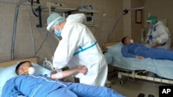 ვაქცინის გამოცდაში მონაწილე მოხალისეები. რუსეთის თავდაცვის სამინისტროს ფოტო 