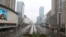 FILE - A street view after the Wuhan government announced to ban nonessential vehicles in a downtown area to contain the coronavirus outbreak, on the second day of the Chinese Lunar New Year, in Wuhan, Hubei province, China, Jan. 26, 2020.