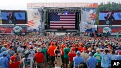 FILE - President Donald Trump waves to the crowd of scouts at the 2017 National Boy Scout Jamboree at the Summit in Glen Jean, West Virginia, July 24, 2017.