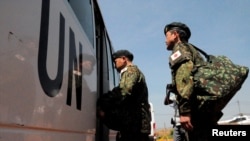 Japanese peacekeepers arrive at the Juba airport to participate in the United Nations Mission in South Sudan (UNMISS) in South Sudan's capital Juba, November 21, 2016. REUTERS/Jok Solomun