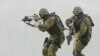 FILE - Soldiers of the Kommando Spezialkraefte, the German Bundeswehr's special forces, take part in a training exercise in Calw, southern Germany, Feb. 5, 2004.