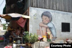 Graffiti in Boeung Kak area in Phnom Penh. (Courtesy of Sorita Heng)