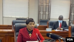 FILE - Monica Mutsvangwa, Zimbabwe’s information minister, talks to reporters in Harare, July 06, 2021. Mutsvangwa says a recent spike in COVID-19 cases has forced authorities to ask all government workers to be vaccinated. (Columbus Mavhunga/VOA)