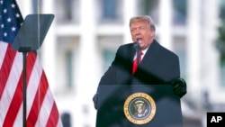 FILE - President Donald Trump speaks during a rally protesting the electoral college certification of Joe Biden as president in Washington, Jan. 6, 2021. 