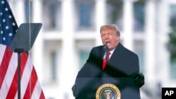 FILE - President Donald Trump speaks during a rally protesting the electoral college certification of Joe Biden as President in Washington, Jan. 6, 2021. 