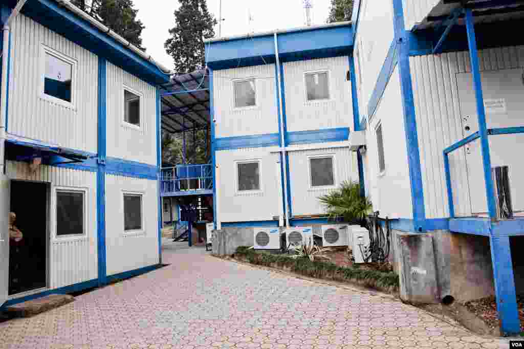 Abkhaz Syrian refugees are housed in blue and white prefabricated houses, installed in Sukhumi for United Nations peacekeeping monitors who worked in Abkhazia after the 1992-1993 war. (V. Undritz for VOA)