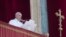 Pope Francis reads is message before delivering the Urbi et Orbi (Latin for 'to the city and to the world' ) Christmas' day blessing from the main balcony of St. Peter's Basilica at the Vatican, Dec. 25, 2019.