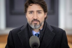 FILE - Canadian Prime Minister Justin Trudeau speaks during a COVID-19 pandemic briefing from Rideau Cottage in Ottawa, Nov. 20, 2020.