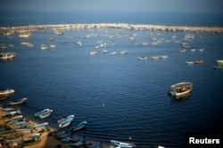 FILE - Fishing boats float at the Seaport of Gaza City, April 4, 2016.