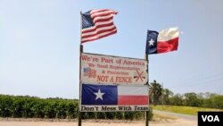 Dressed as superheroes, Jo Proudlove and daughter Eve, 9, follow the daily online &quot;PE with Joe&quot; Joe Wickes&#39; exercise class on &quot;Fancy dress Friday,&quot; at home in London, as the spread of the coronavirus disease (COVID-19) continues.