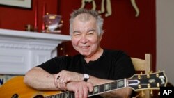 John Prine poses in his office in Nashville, Tennessee, June 20, 2017.
