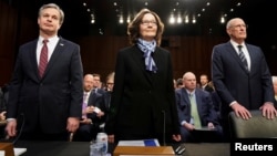 Директор ФБР Кристофер Рэй; директор ЦРУ Джина Хаспел и директор национальной разведки Дэн Коутс