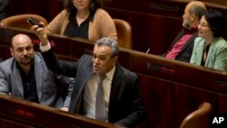 Iceland horses are driven back from their willow to the stables on a stud in Wehrheim near Frankfurt, Germany.