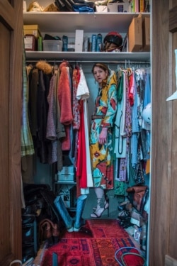 This photo shows a self-portrait by artist Lara Alcantara in her home in the Brooklyn borough of New York. The Venezuelan photographer has channeled her pandemic-related anxiety through a series of self-portraits that sometimes put her in an imaginary world. (Lara Alcantara via AP)