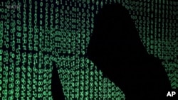 Ilustrasi penyerangan dalam dunia maya. (Foto: AP)