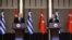 Turkish Foreign Minister Mevlut Cavusoglu and his Greek counterpart Nikos Dendias hold a news conference in Ankara, Turkey, April 15, 2021. (Turkish Foreign Ministry/Handout via Reuters)