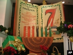 FILE - The seven principals of Kwanzaa are unity, self-determination, collective work and responsibility, cooperative economics, purpose, creativity, and faith.