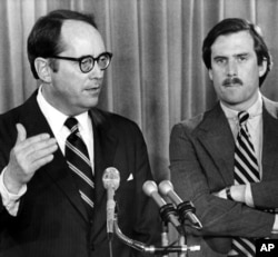 Pennsylvania Gov. Dick Thornburgh, left, announces the closing of schools around the Three Mile Island Nuclear Power Plant on March 30, 1979.
