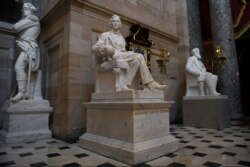 FILE - A statue of Alexander Stephens of Georgia is on display in Statuary Hall on Capitol Hill in Washington, June 11, 2020.