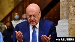 Lebanon's Prime Minister-designate Najib Mikati attends Friday prayers before meeting with Lebanon's President Michel Aoun, at a mosque in Beirut, Sept. 10, 2021. (Dalati Nohra/Handout via Reuters) 