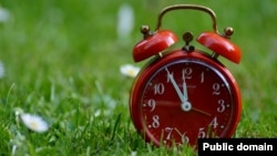 Don't forget to set your alarm clock! Pictured is an old-fashioned version. Today, most people use digital clocks or mobile phones.