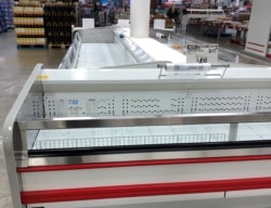 As state after state reports new cases of COVID-19 infections, shoppers rush to stores to stock up on supplies, leaving the shelves empty, March 14, 2020. (Photo: Diaa Bekheet)