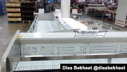 As state after state reports new cases of COVID-19 infections, shoppers rush to stores to stock up on supplies, leaving the shelves empty, March 14, 2020. (Photo: Diaa Bekheet)