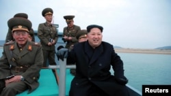 North Korean leader Kim Jong Un inspects the defence detachment on Mahap Islet in the western sector of the front in this undated photo released by North Korea's Korean Central News Agency (KCNA) in Pyongyang November 11, 2016. REUTERS/KCNA