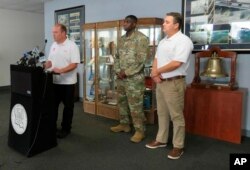 Heath Jones, chief of emergency management for the Army Corps of New Orleans New Orleans District, talks to reporters at the agency's offices, May 9, 2019, about plans to reopen the Bonnet Carr Spillway to relieve stress on the levees at New Orleans. Behind him are Maj. Jordon Davis, deputy commander of the district, and David Ramirez, chief of water management.