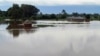 Homes flooded by water after the river Sondu Miriu burst it's banks in southern Nyanza , Kenya, April 29, 2012.