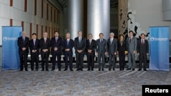 Trade ministers from a dozen Pacific nations in Trans-Pacific Partnership Ministers meeting post in TPP Ministers "Family Photo" in Atlanta, Georgia, October 1, 2015.