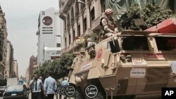 Soldiers guard a street near a church in downtown Cairo, Egypt, April 10, 2017, following Palm Sunday bombings in churches in Tanta and Alexandria that killed 45 Coptic Christians.