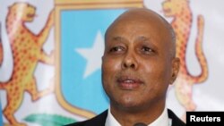 FILE - Somalia's Prime Minister Abdiweli Sheikh Ahmed delivers his speech at the Parliament Building in Mogadishu, Dec. 21, 2013. 