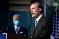 FILE - President-elect Joe Biden's national security adviser nominee Jake Sullivan speaks at The Queen theater, in Wilmington, Del., Nov. 24, 2020.