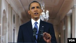 Presiden AS Barack Obama menyampaikan pidato lewat televisi di Gedung Putih, mengenai rencana penarikan pasukan AS dari Afghanistan, Rabu malam (22/6).