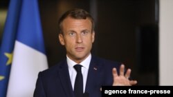 FILE - French President Emmanuel Macron speaks during a press conference after the 74th Session of the United Nations General Assem.bly at the French mission to the UN in New York, Sept. 24, 2019.