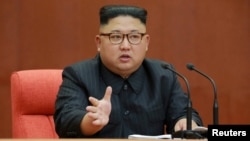 Kim Jong Un speaks during the Second Plenum of the 7th Central Committee of the Workers' Party of Korea (WPK) at the Kumsusan Palace of the Sun, in this undated photo released by North Korea's Korean Central News Agency (KCNA) in Pyongyang, Oct. 8, 2017.