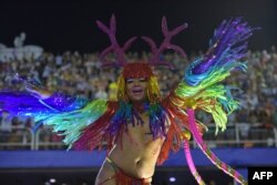 Members of the Sao Clemente samba school perform during the second night of Rio's Carnival parade at the Sambadrome in Rio de Janeiro, Brazil, March 4, 2019.