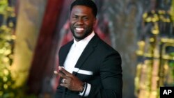 FILE - In this Dec. 11, 2017 file photo, Kevin Hart arrives at the Los Angeles premiere of "Jumanji: Welcome to the Jungle" in Los Angeles. 