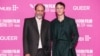 Director Luca Guadagnino, left, and actor Drew Starkey pose for photographers upon arrival at the premiere for the film "Queer" during the London Film Festival, Oct. 17, 2024, in London. (Scott A. Garfitt/Invision/AP)