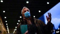 European Commission's Head of Task Force for Relations with the United Kingdom Michel Barnier talks to the media outside the EU headquarters in Brussels, Dec. 14, 2020. 