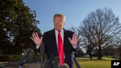 President Donald Trump speaks on the South Lawn of the White House as he walks to Marine One, Jan. 6, 2019, in Washington.