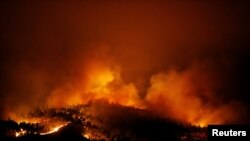 Sebuah kebakaran hutan tampak dekat Tojeira, Pedrogao Grande, di Portugis tengah, 18 Juni, 2017.