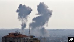 Military pallbearers carry the casket of British World War I soldier William McAleer during a reburial service at the Loos British World War I cemetery in Loos-en-Gohelle, France. Private William McAleer of the 7th Battalion, Royal Scots Fusiliers was killed in action on Sept. 26, 1915 during the Battle of Loos. His body was found and identified in 2010 during routine construction in the area and is being reburied with full military honors along with 19 unknown soldiers.
